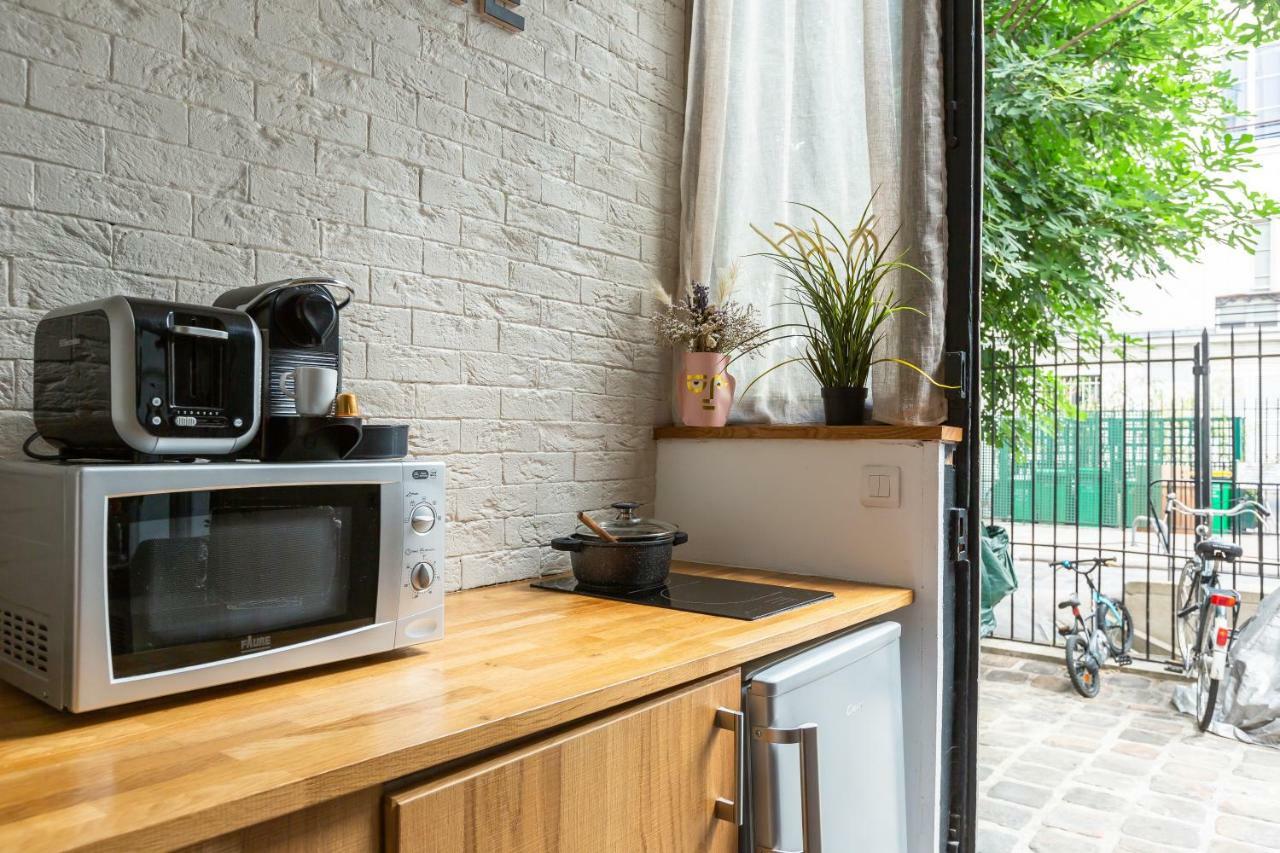 Apartamento Artisan Lofts courtyard Opéra París Exterior foto